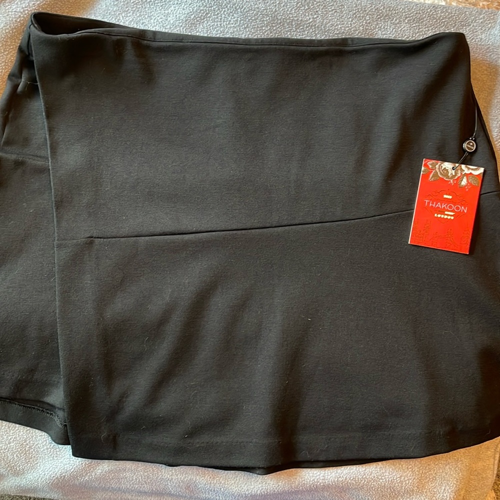 Thakoon By Kohl’s short black wrap skirt 17.5 in long in the front.